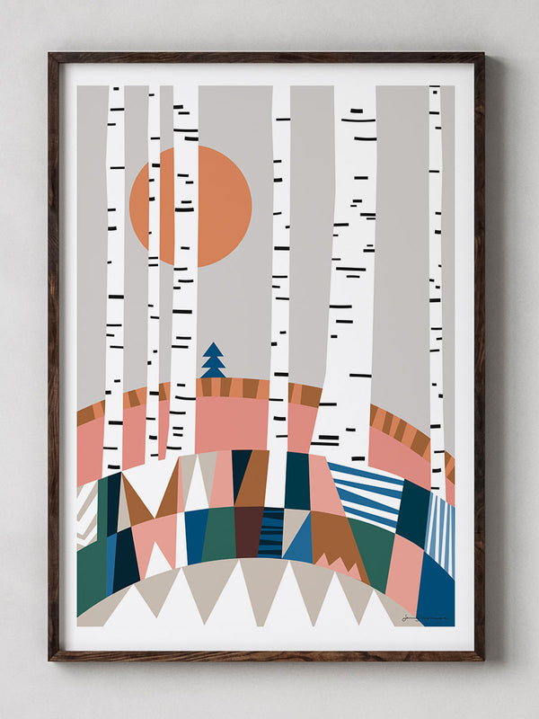 Björkskog är en färgrik poster som föreställer en björkskog med solen på väg ner bakom kullarna. 